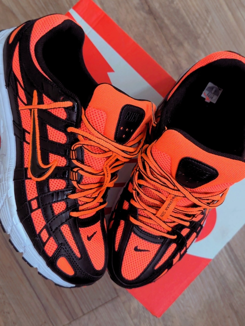 Nike Men’s Orange and Black P-6000